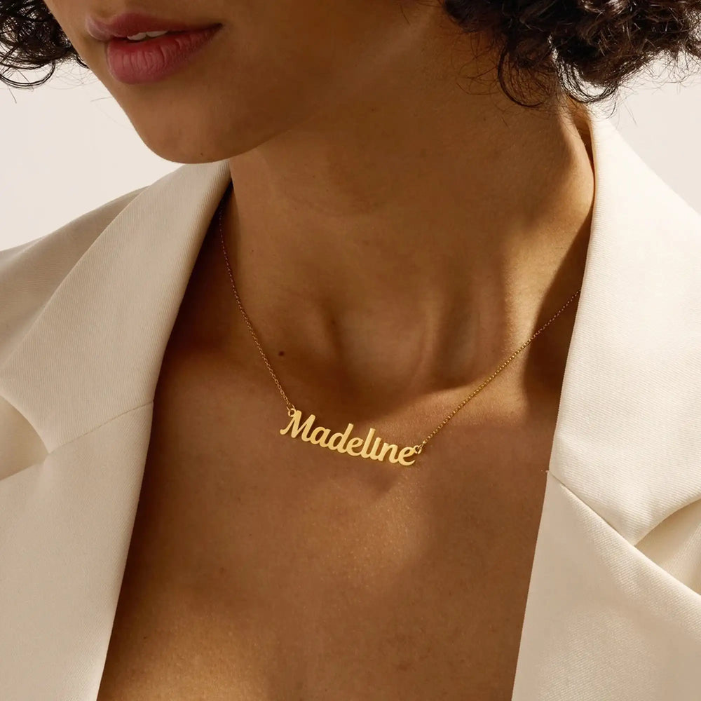 Custom Name Necklace in Gold featuring the name Madeline on a delicate chain