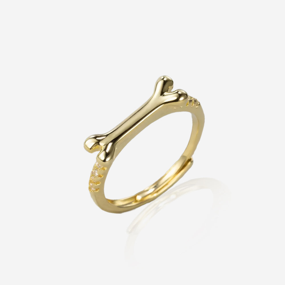Stylish gold Dog Bone Ring featuring a bone design and sparkling accents for dog lovers