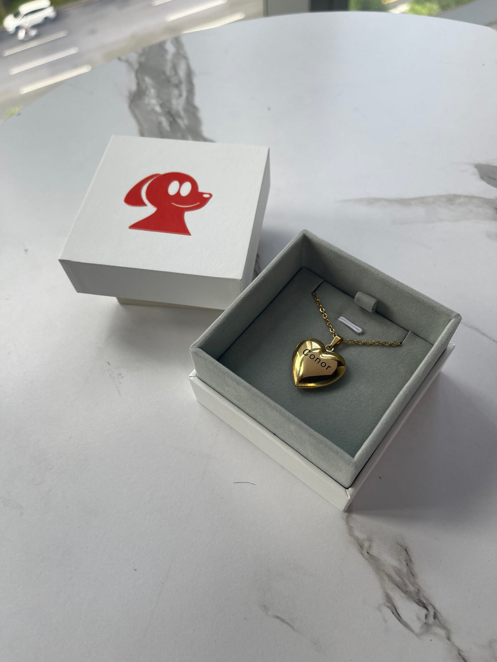 Gold Locket Heart Necklace displayed in a gift box from iPetprints with a minimalist design