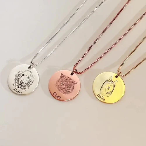 Custom Dog Jewelry featuring unique pet paw print necklaces and dog face rings in various metal finishes