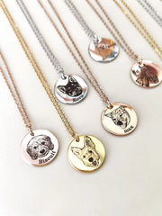 Custom Pet Face Necklaces in gold, rose gold and silver showing engraved dog faces and names on round pendants