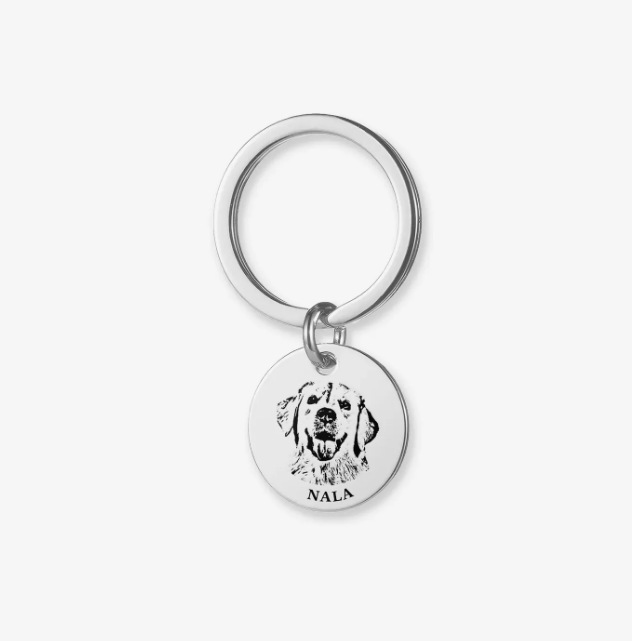 Silver pet face keychain with engraved dog portrait and name Nala showing why pet face keychains make the perfect keepsake