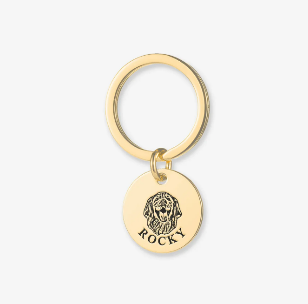 Gold round pet ID key ring showing a detailed dog portrait and name Rocky Pet Face Keychain Deep Engraving