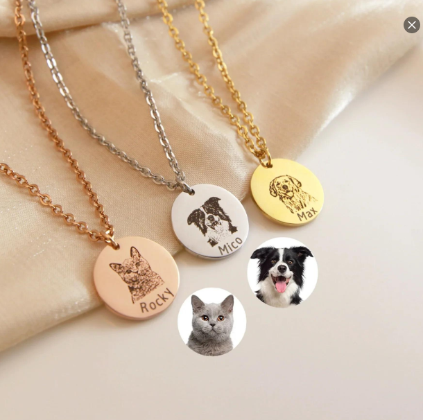 Three engraved round Pet Face Necklaces in rose gold silver and gold showing personalized pet portraits and names