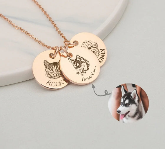 Rose gold Pet Face Necklace with three engraved round pendants showing cat and dog portraits and names