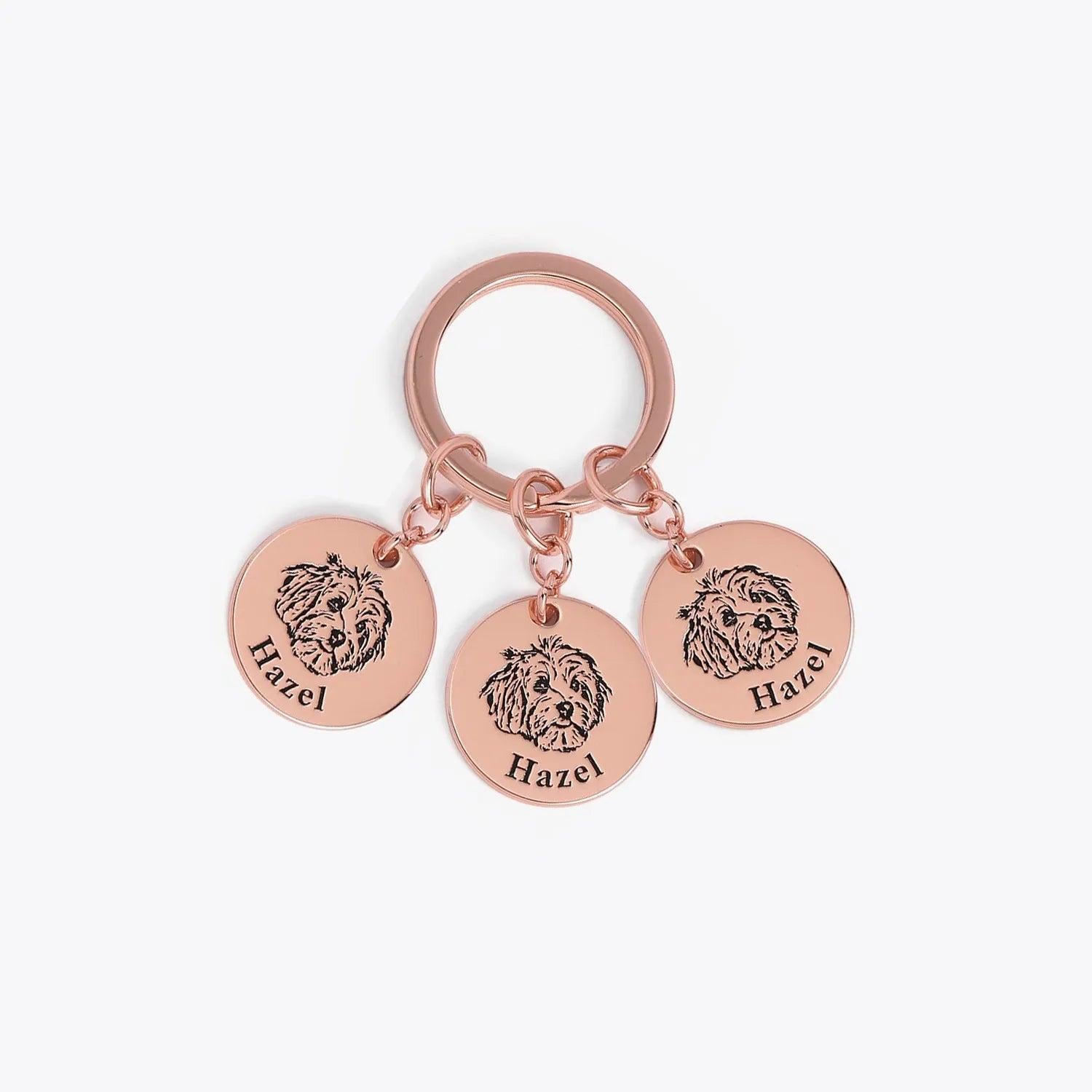 Rose gold custom pet face keychain with three engraved tags, a perfect keepsake for pet loss