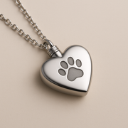 Why a Custom Pet Urn Necklace Is the Perfect Memorial Gift, heart shaped silver urn necklace with paw print pendant