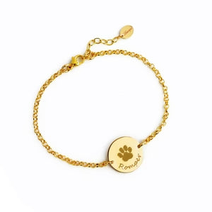 Personalized Pet Bracelet featuring a gold chain and paw print charm for pet lovers