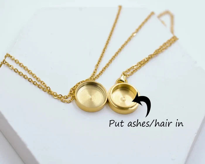 Elegant gold pet memorial jewelry locket designed to hold ashes or hair as a tribute