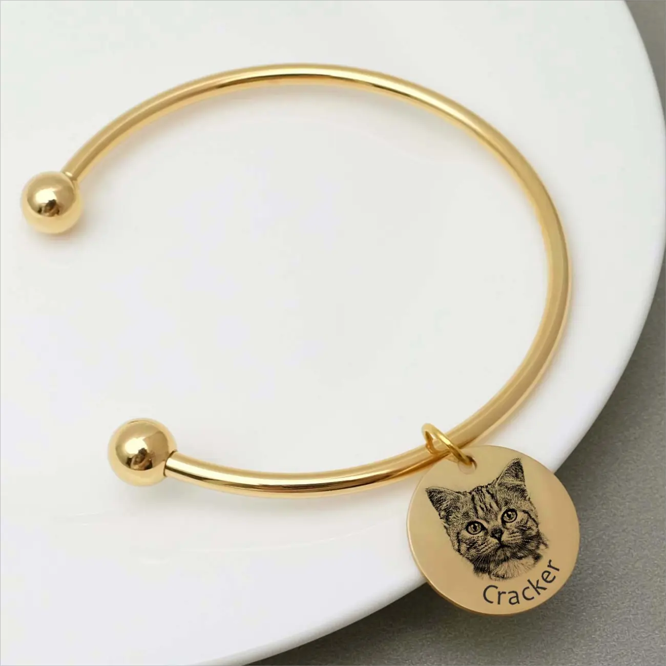 Pet Memorial Bangle with a custom engraved cat tag honoring a beloved pet