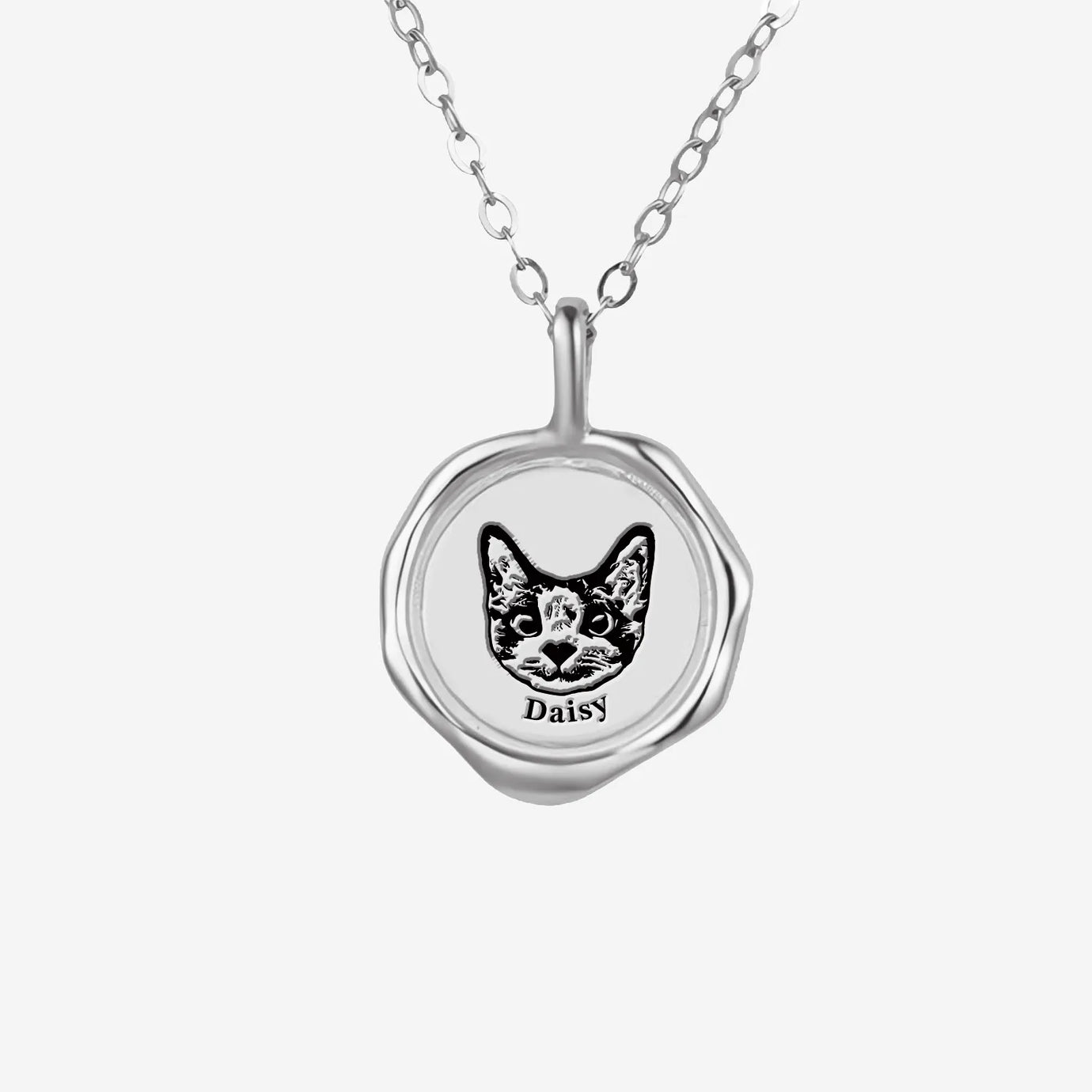 iPetprints Pet Portrait Necklace featuring a custom cat portrait of Daisy in silver
